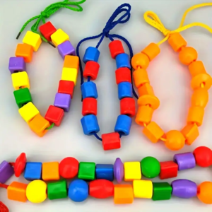 Jouet éducatif en perles à enfiler pour le développement de la motricité fine - - Ensemble pièces avec des cordes à lacer, 20 pieces
